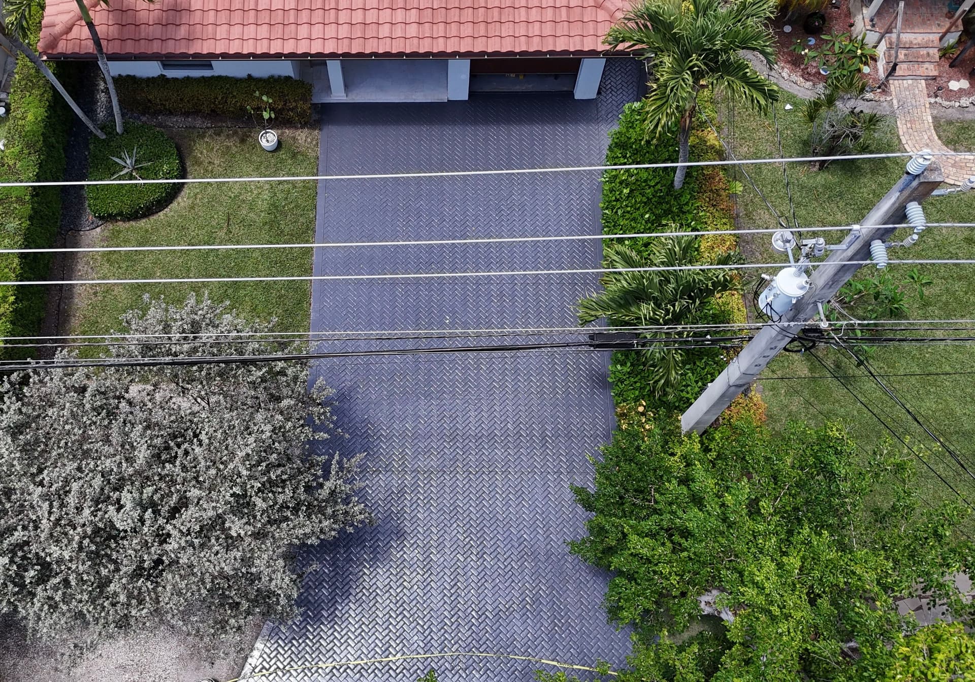 Gallery photos for Stamped Concrete Driveway Pressure Washed and Painted: Image #1