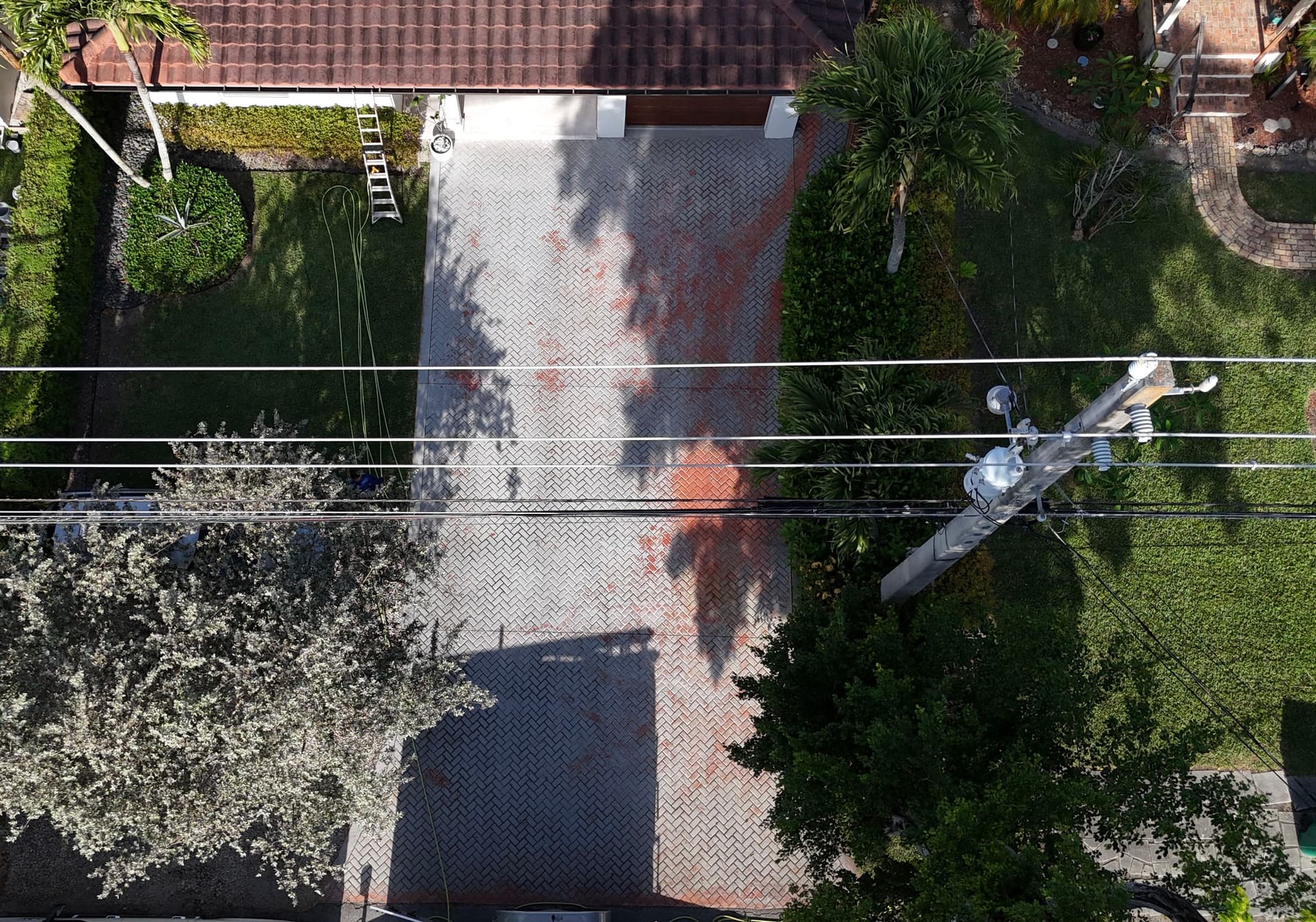 Stamped Concrete Driveway Pressure Washed and Painted image